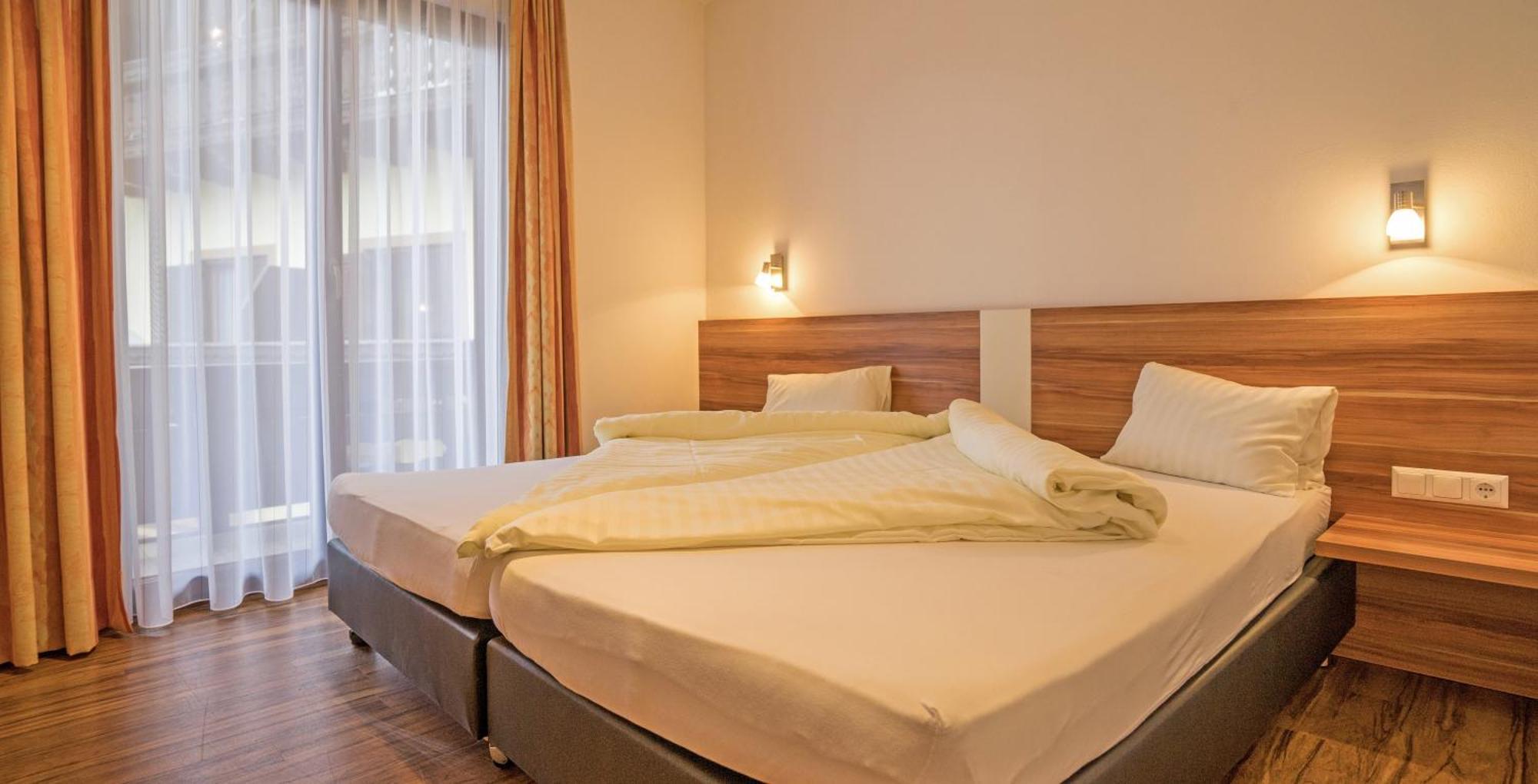 Hotel Haus Stampfer à Weissensee Chambre photo