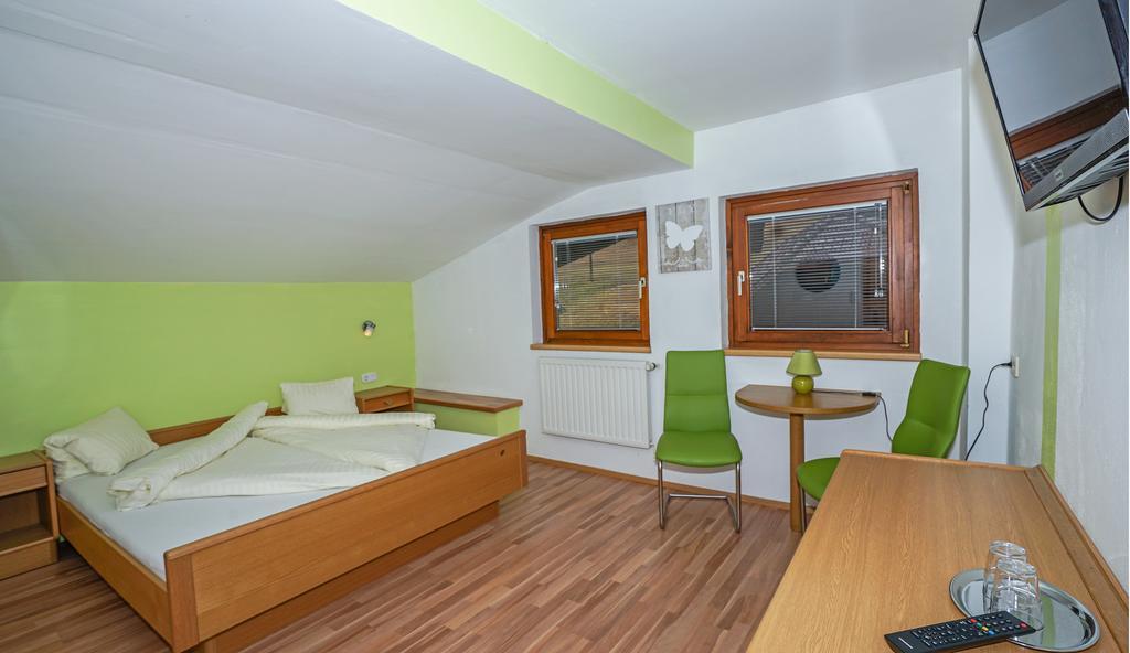 Hotel Haus Stampfer à Weissensee Chambre photo